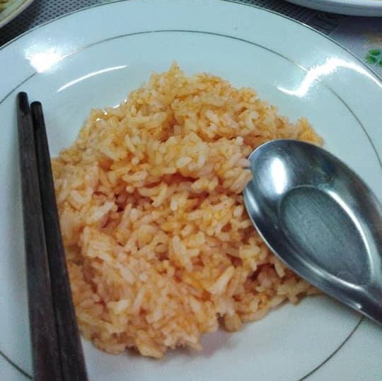 Steaming rice with Gac fruit 
